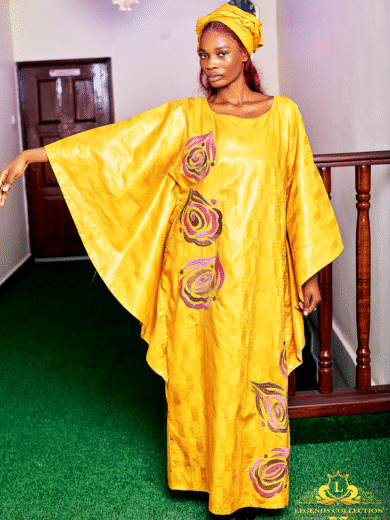 Long gold dress in rich bazin